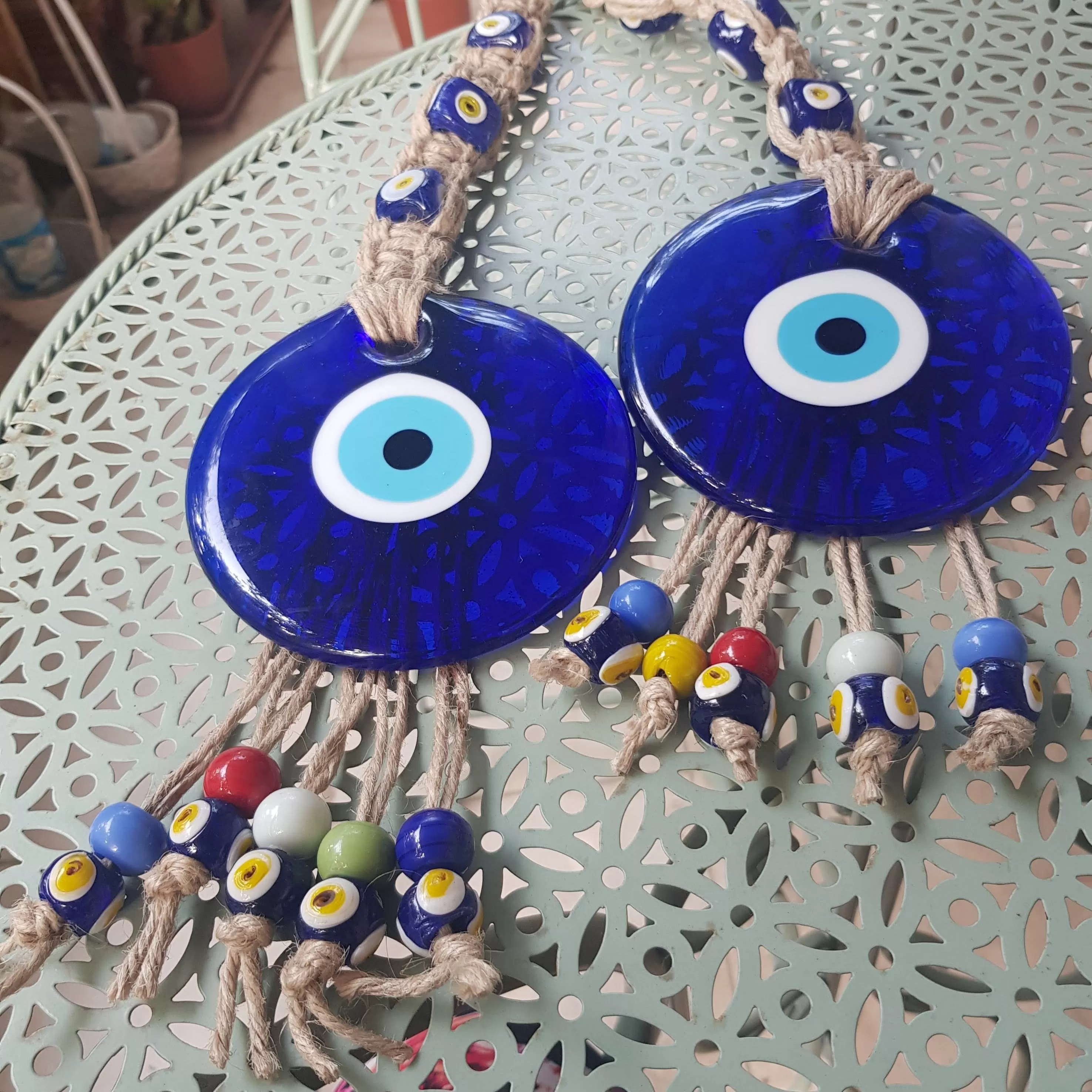 Evil Eye Blue Glass Souvenir Luck and Blue Eyes Symbols and beads on a rope.