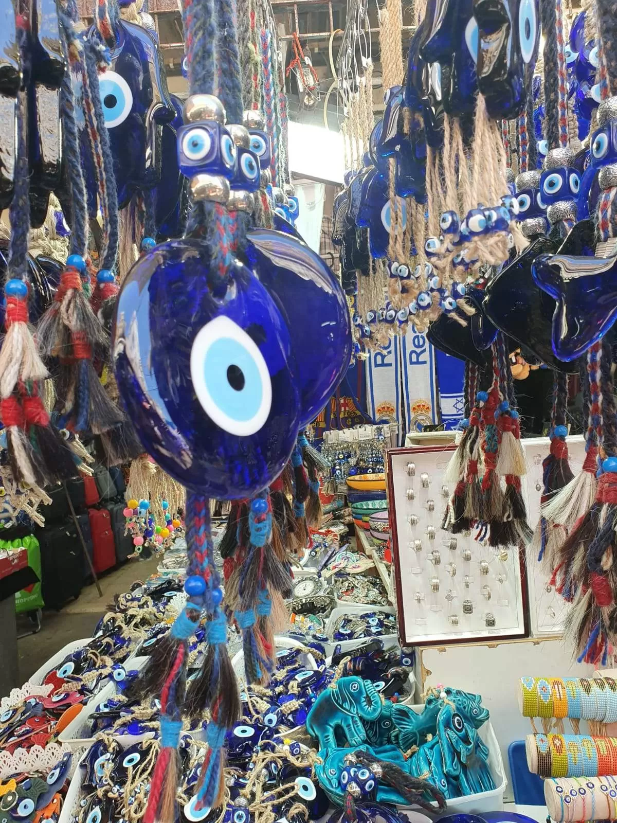 Evil Eye Blue Glass Souvenir Luck and Blue Eyes Symbols and beads on a rope.