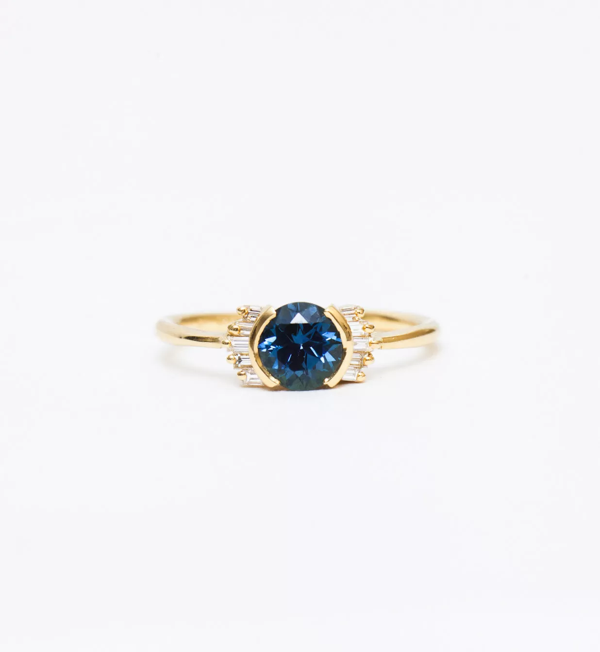 Teal Sapphire Ring with Diamond Frills