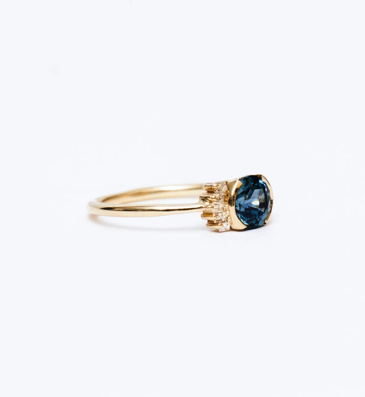 Teal Sapphire Ring with Diamond Frills