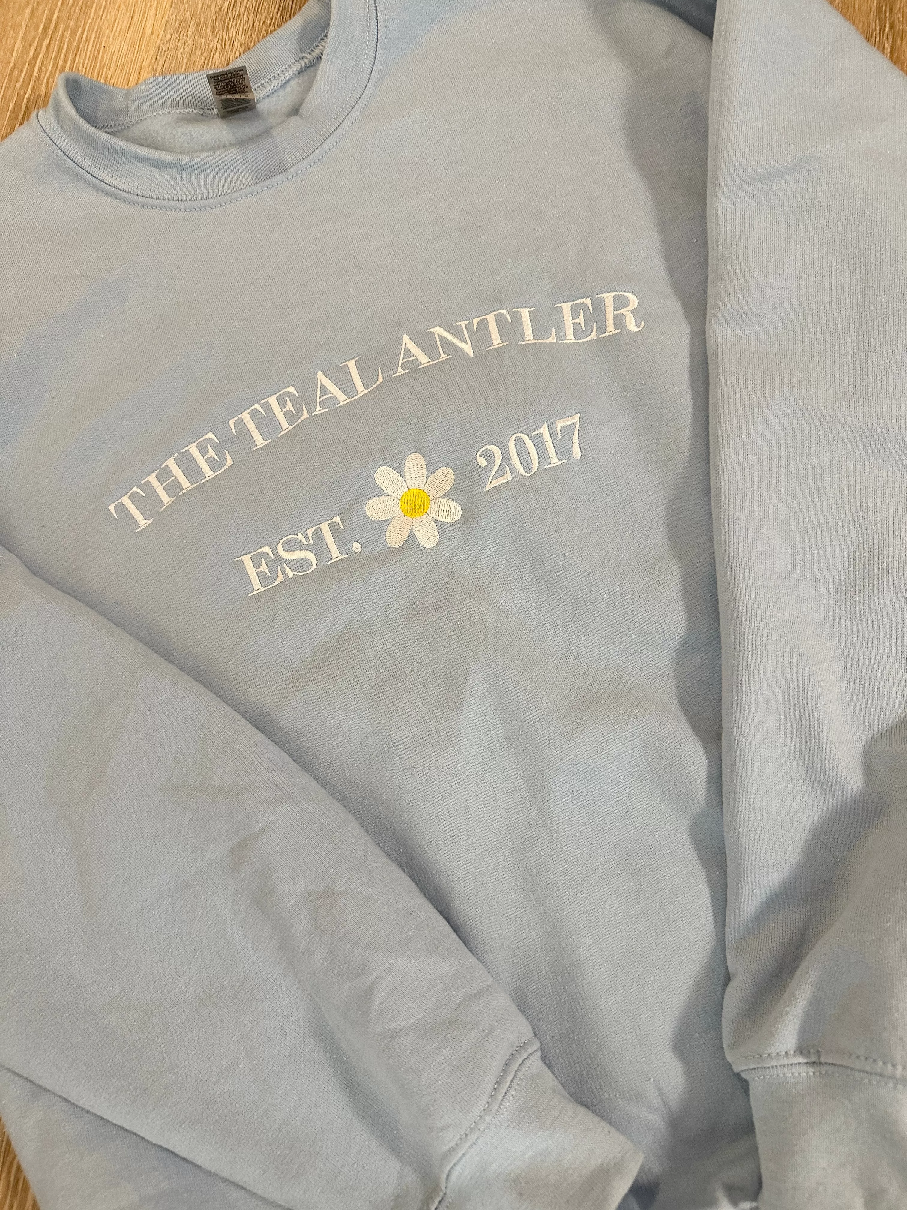 The Teal Antler- Daisy Embroidered Crew Neck